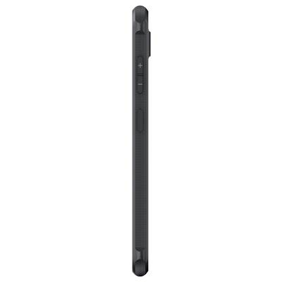 Black, cylindrical soundbar with a view of the top side. Housing has a button in the centre with '+' and '-' symbols.
