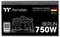 A label with the inscription 'Berlin 750W', an image of the Brandenburg Gate and the German flag. Brand: Thermaltake.