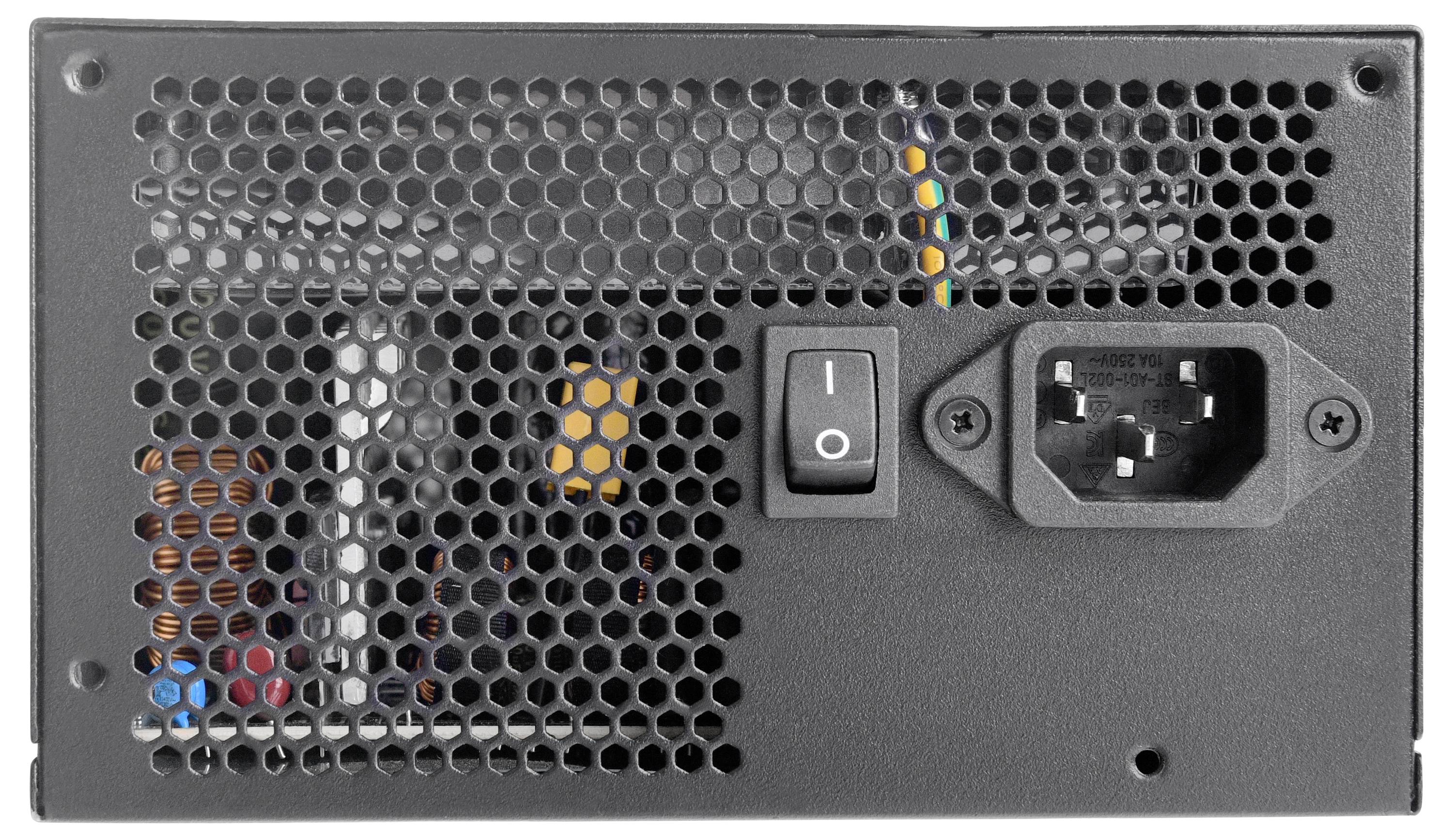 A computer power supply with a ventilation grille, a power switch, and a power socket.