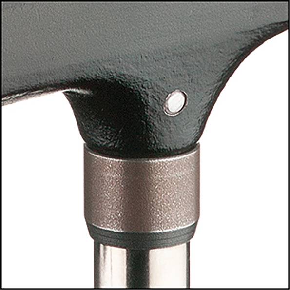 View of a padded chair connection with a silver metal support that protrudes from beneath a black padded seat.