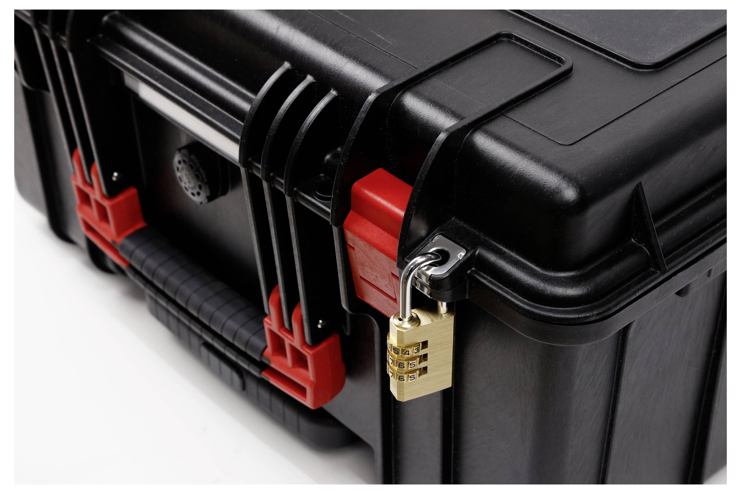 Black plastic case with red closure and combination lock. Robust construction, suitable for secure transportation of valuable contents.
