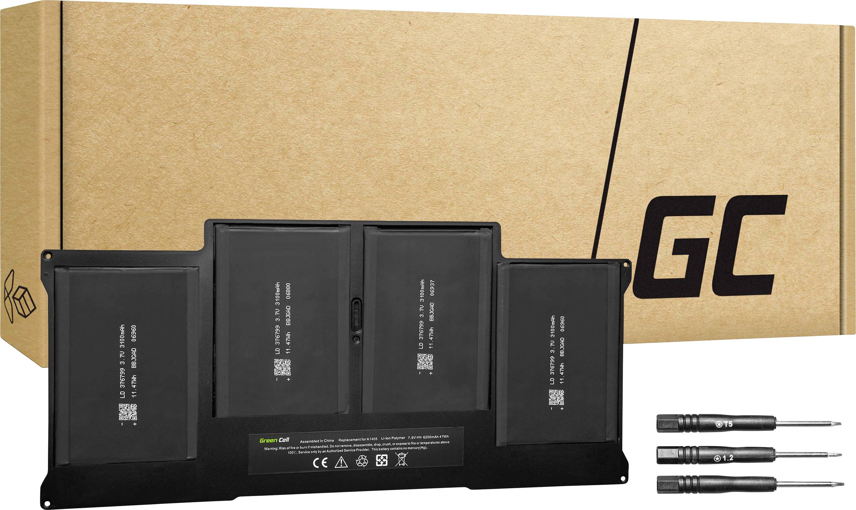 Laptop battery pack beside a box with a 'GC' logo. Two screwdrivers are lying next to it, presumably intended for installation.