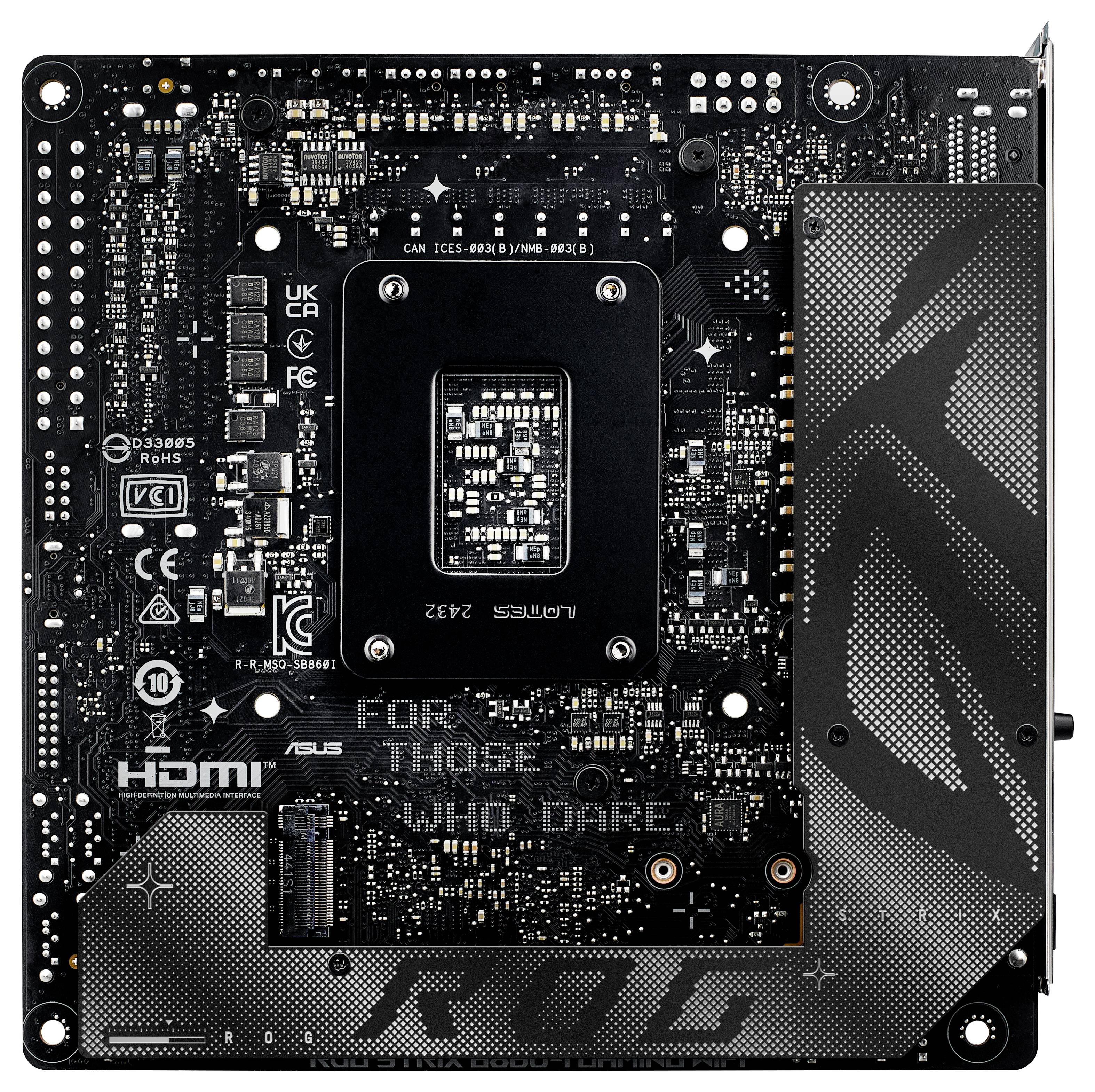 A computer motherboard with 'STRIX' branding, featuring an exposed central processor socket and multiple heat sinks on a compact design.