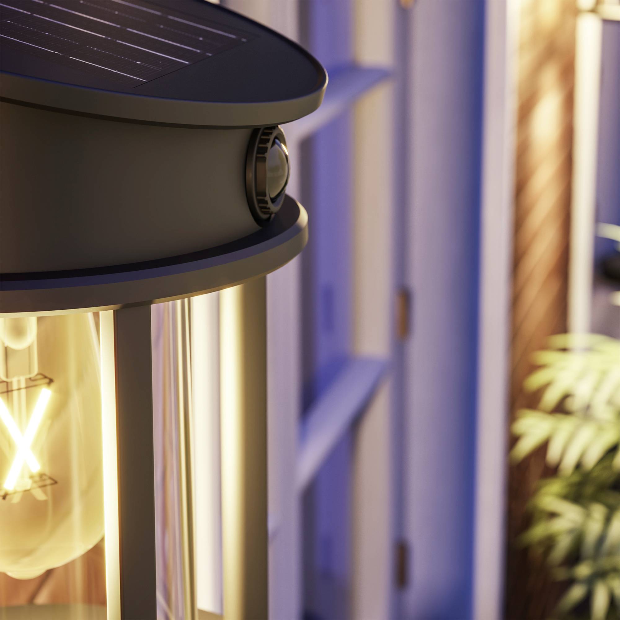 Solar lamp with warm light on a terrace at dusk. The lamp has a modern design with visible filament.