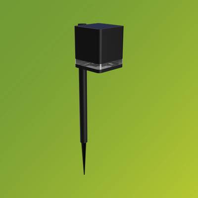 A black, cube-shaped device with a ground spike on a green background, possibly a solar-powered garden light.