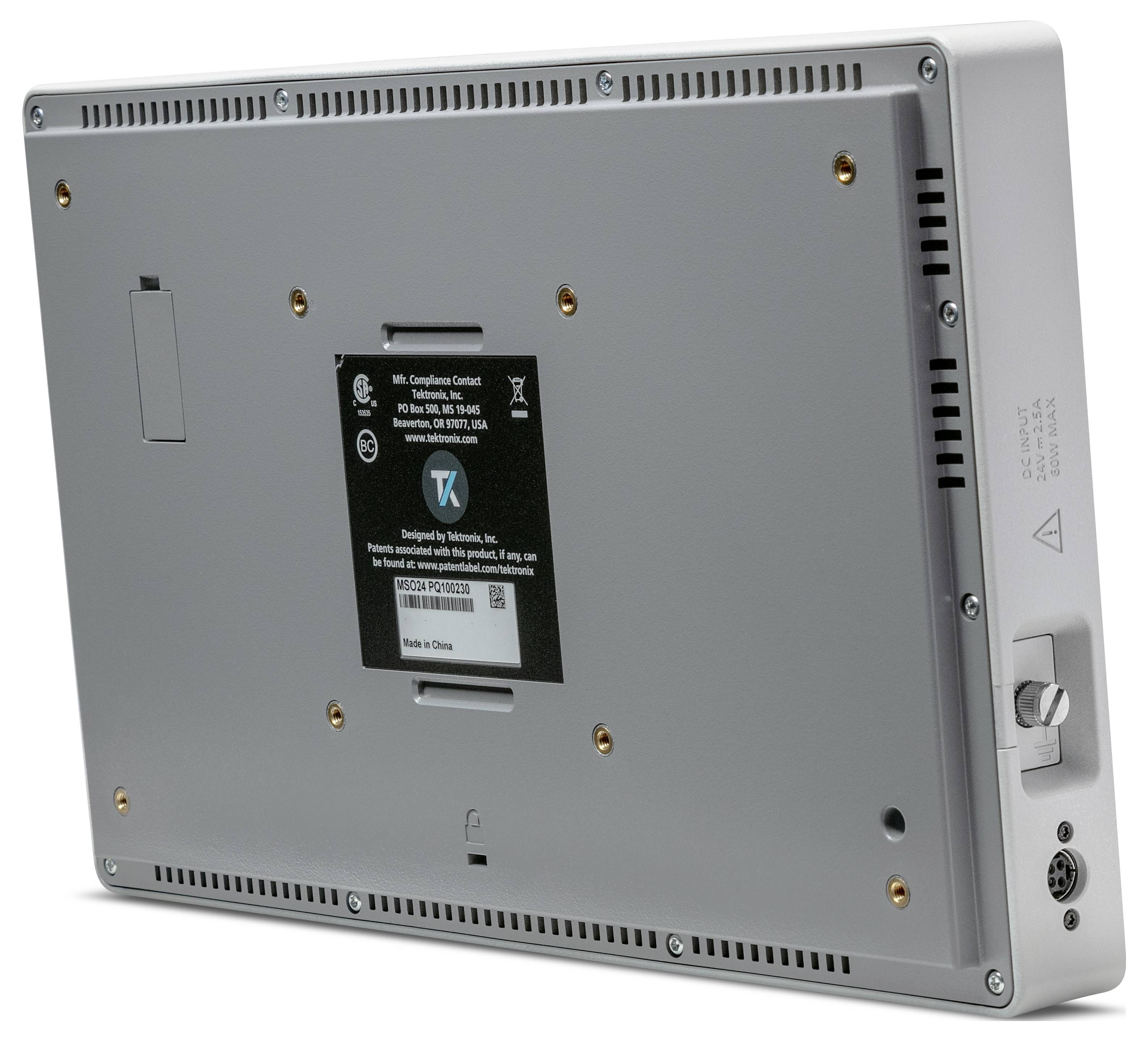 The back of an electronic device with multiple screws, a manufacturer's label in the centre, and a connection socket on the right side.