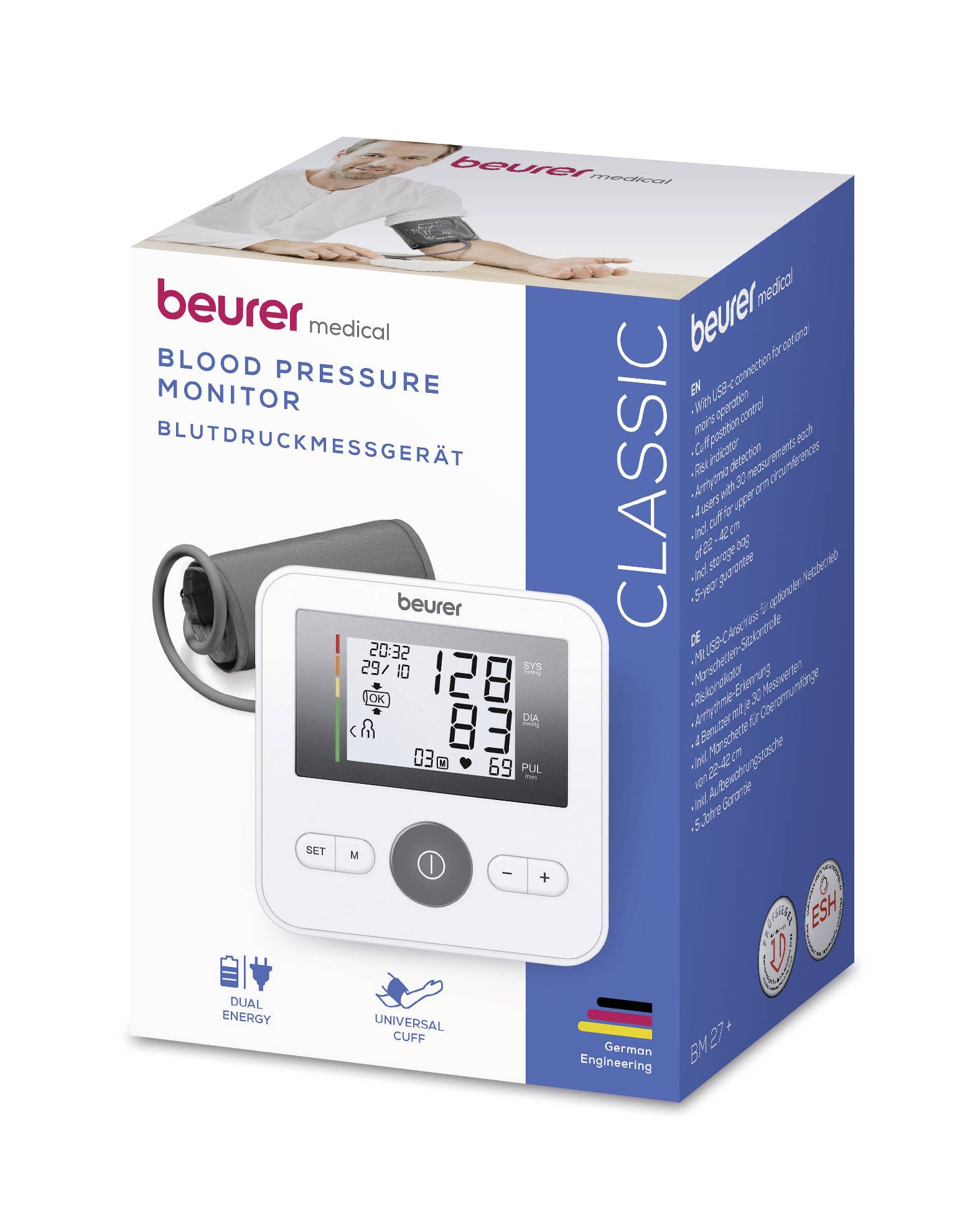 Packaging for a blood pressure monitor with a digital display. Print: 'Beurer'. Functions and product details are visible.