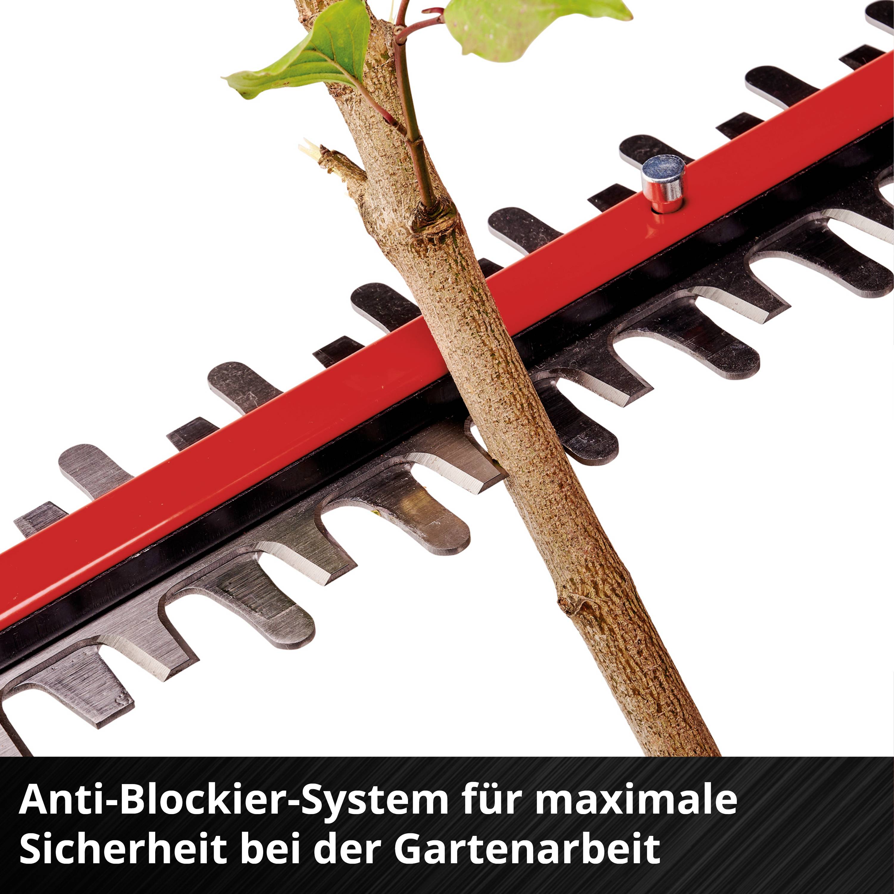 Close-up of hedge trimmers with a small twig caught between the blades. Text below reads: 'Anti-blocking system for maximum safety during garden work'.