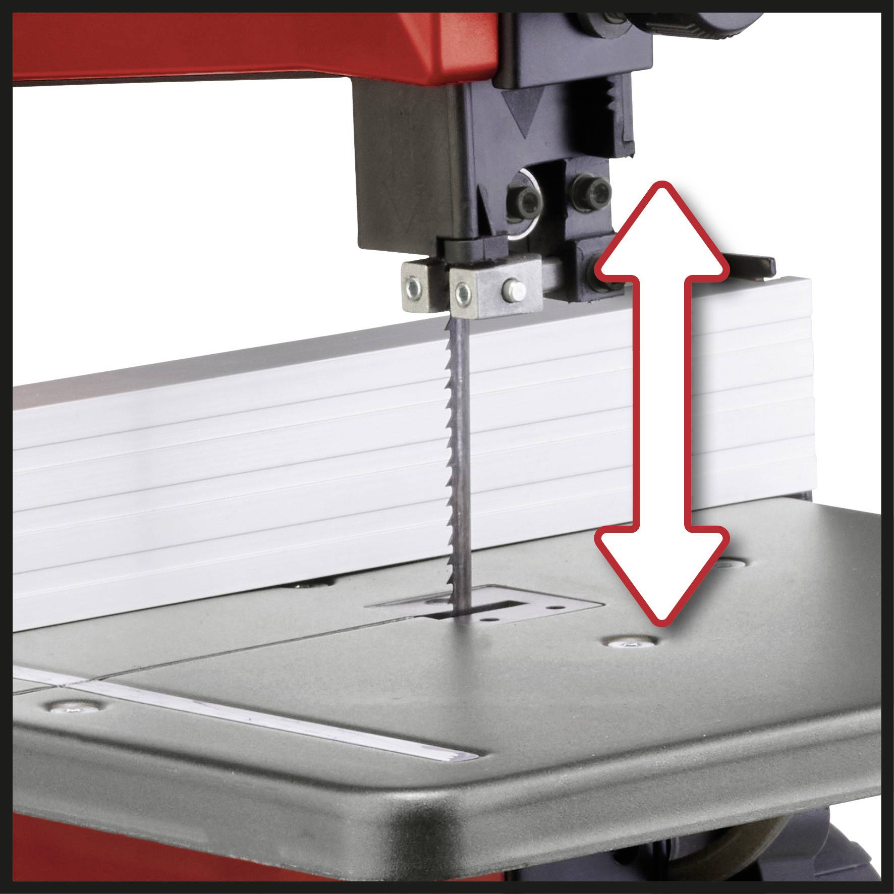 A bandsaw with a vertically guided saw blade. An arrow points up and down to indicate the movement of the saw blade.