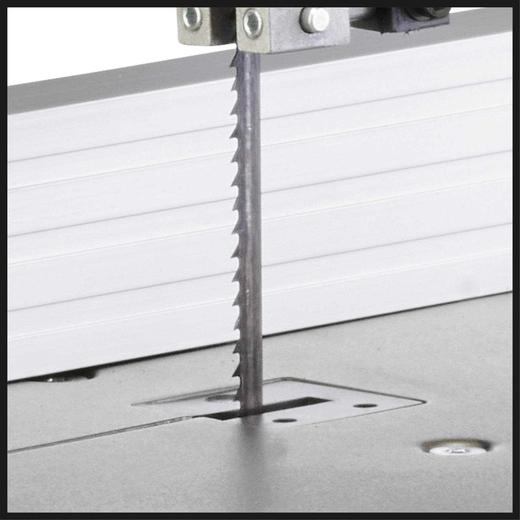 Close-up of a bandsaw vertically inserted into a metal base. The saw's teeth are sharp and clearly visible.