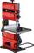 Red Einhell band saw with steel plate, suitable for precise wood cutting. It features a safety switch and a robust design.