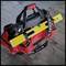 A red tool bag on a table, filled with tools such as a spirit level and hand tools, for construction work or repairs.