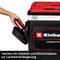 A man places a red accessory box into a black Einhell bag with a zip. Text below: 'Bags for accessories and interchangeable inserts'.