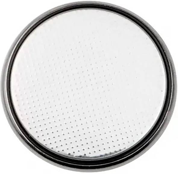 A silver button cell battery made of metal, primarily used for small electronic devices.