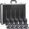 Six radio devices with microphones are positioned in front of a metallic carrying case. All devices are identical and suitable for communication.