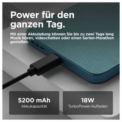 Smartphone with two camera lenses, leather-look back and green Motorola logo in the centre.