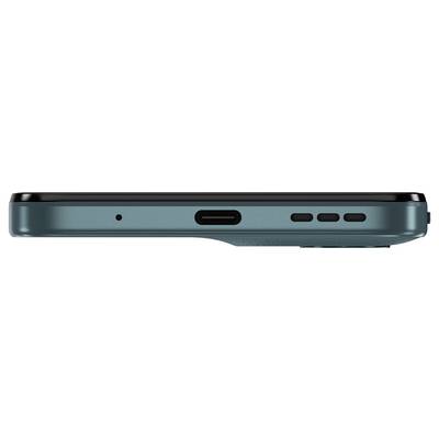 A teal smartphone viewed from the bottom, showing a charging port, microphone, and speaker grilles.