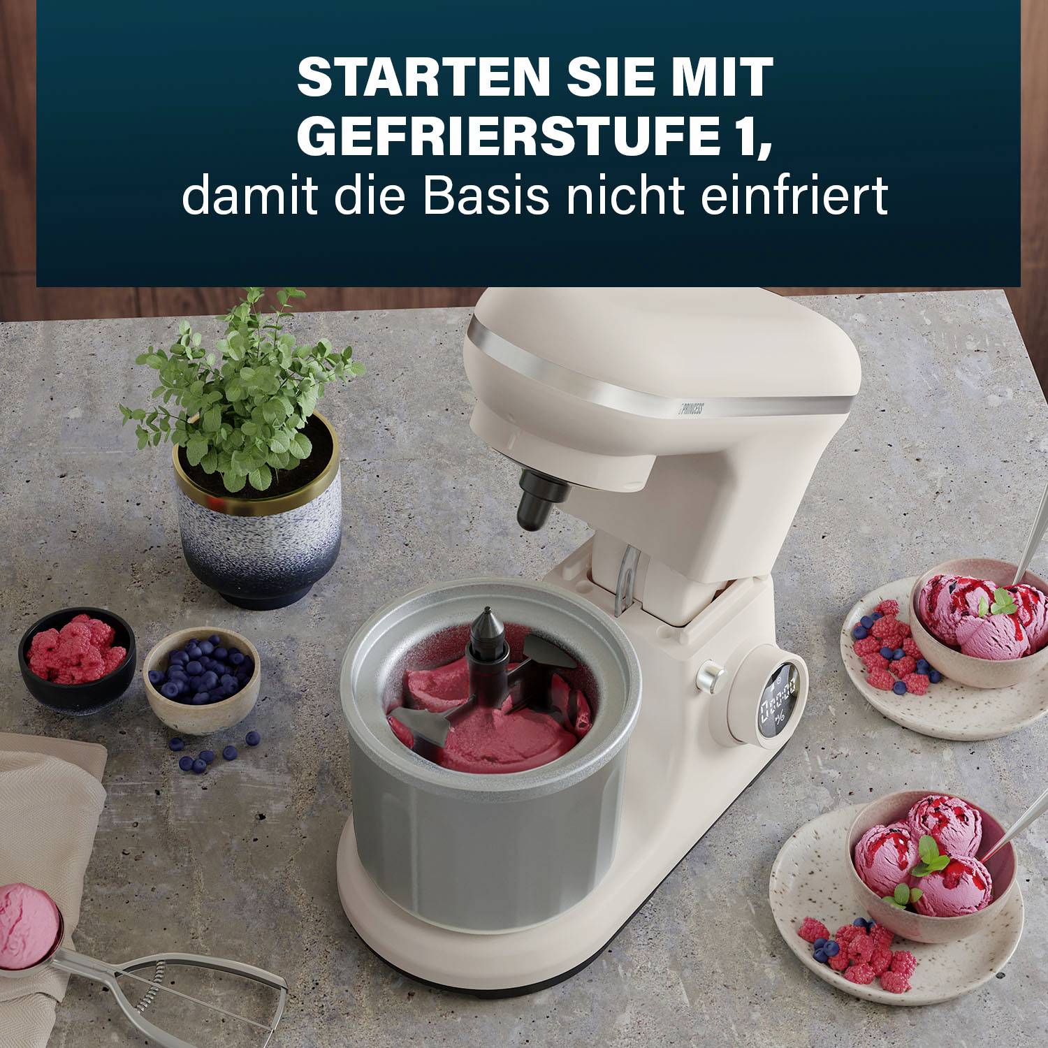 A white ice cream maker on a kitchen worktop with frozen yoghurt, berries, and herbs. Text: 'Start with Freezer Level 1 so the base does not freeze'.
