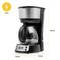 Coffee machine with glass carafe, 600 W power. Dimensions: 26.9 cm high, 21.6 cm wide, 14.8 cm deep. Digital display located in the bottom left.