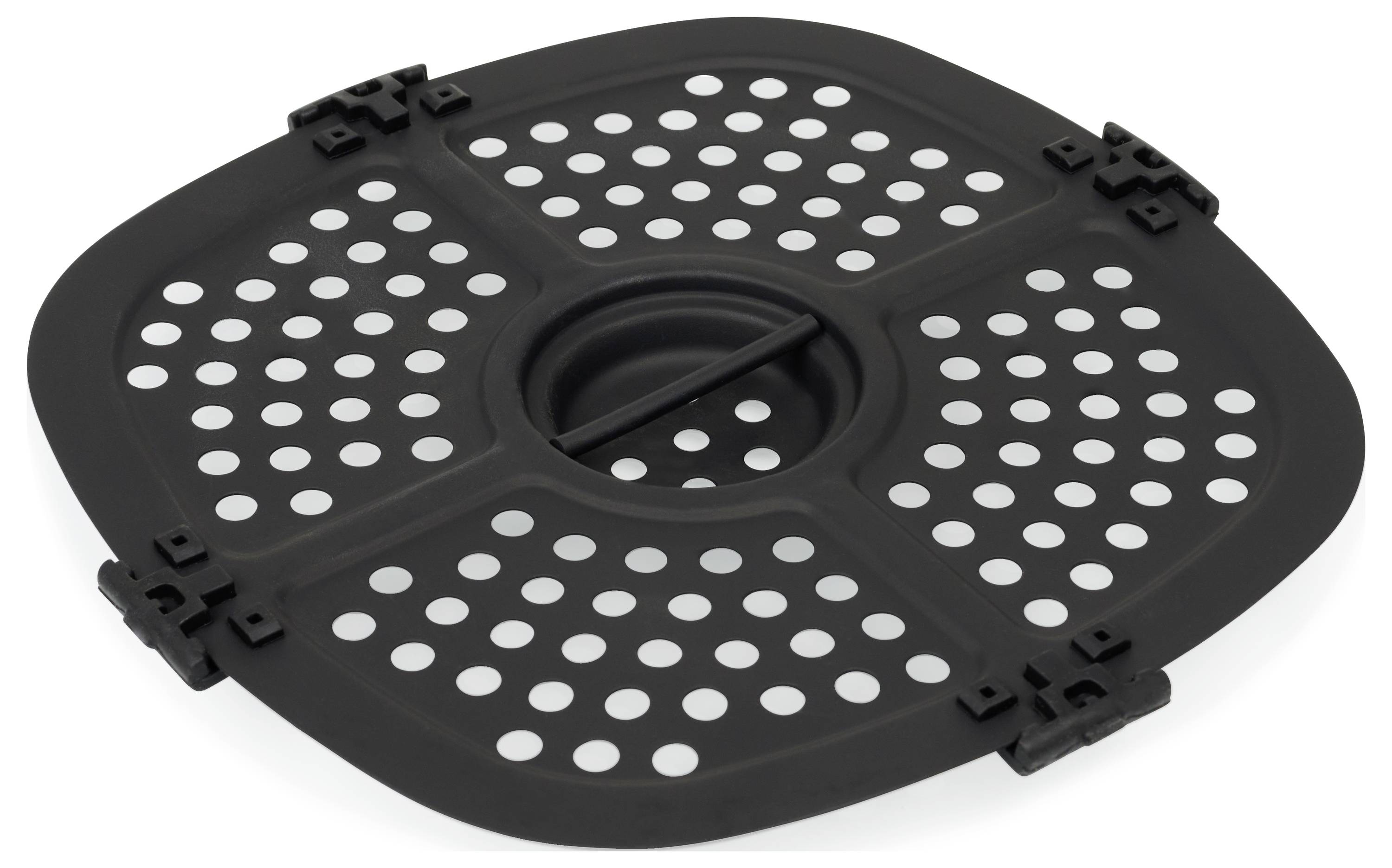 A black foldable silicone cooking mat with round holes, which is square and has hinges at the corners.