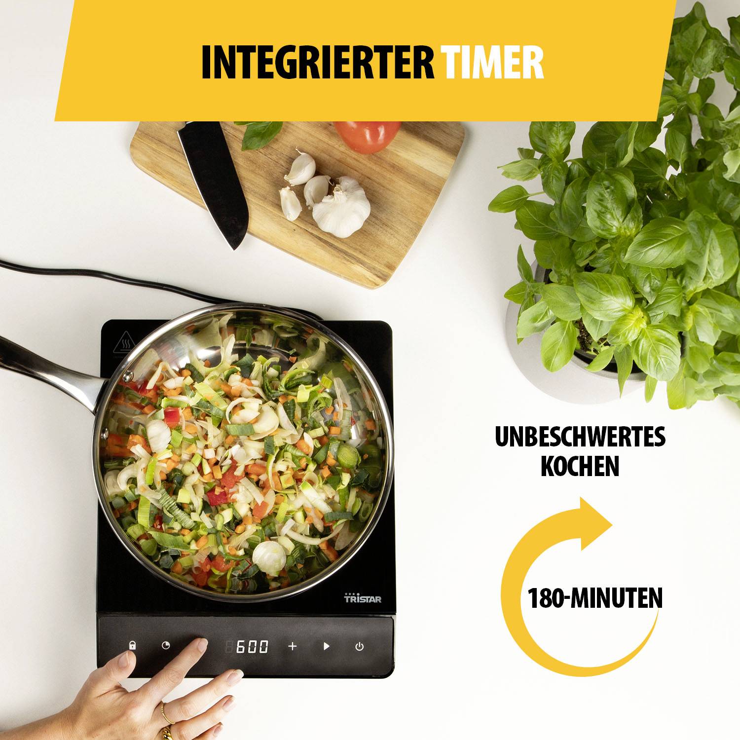 A hand is operating a hob timer, while vegetables are being cooked in a pot on a cooker. Text in image: 'Integrated Timer', 'Carefree Cooking', '180-Minutes'.