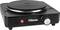 Single black electric cooker with circular hob, red indicator light and silver control knob, brand name 'TRISTAR'.