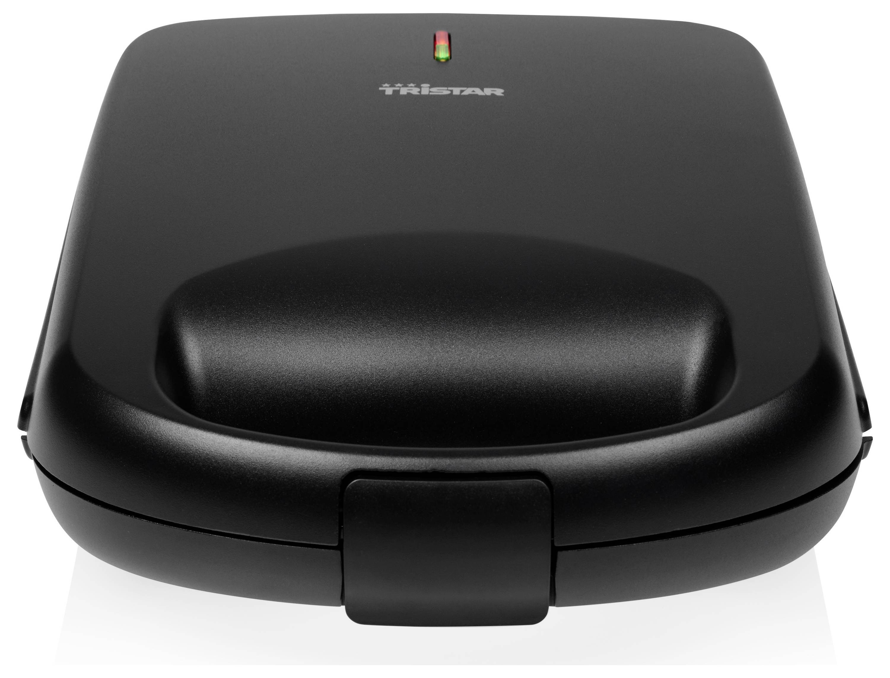 A black sandwich maker with a closed lid and two control lights on top, one green and one red.