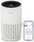 Bosch air purifier with digital display; shows connection to a smartphone app indicating air quality as 'Good'.