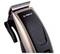 Electric hair clipper with black and bronze design, conveniently side-grippable. 'Alpina' brand logo visible at the top.