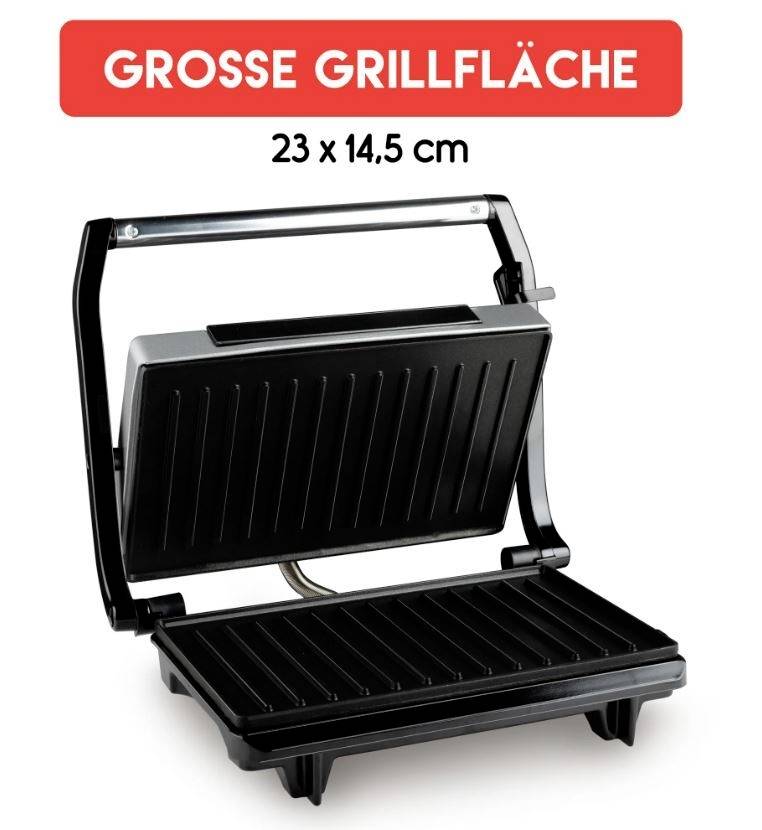 An open electric barbecue with the inscription 'LARGE GRILLING AREA'. Dimensions: 23 x 14.5 cm.