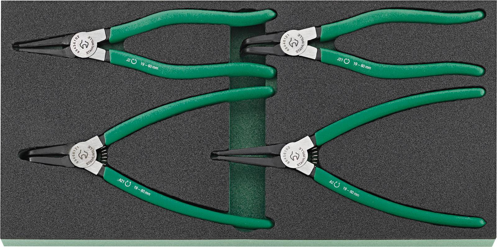 Four green pliers in a foam insert, arranged in two rows. Suitable for gripping and cutting wires.