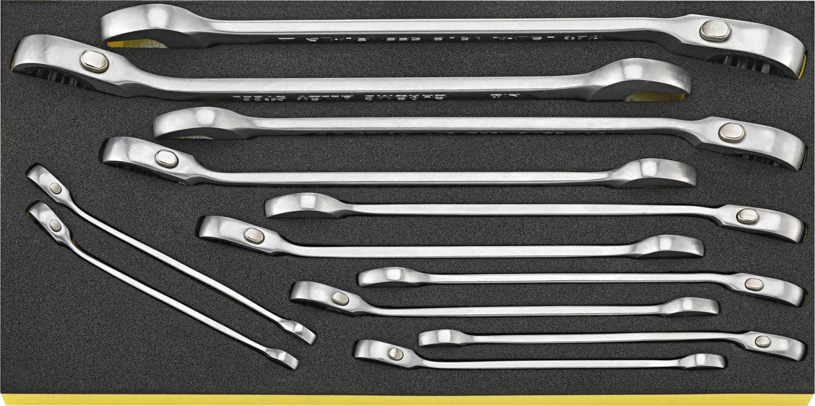 A set of ten silver ratchets with curved handles, in various sizes, neatly arranged in a black foam insert.