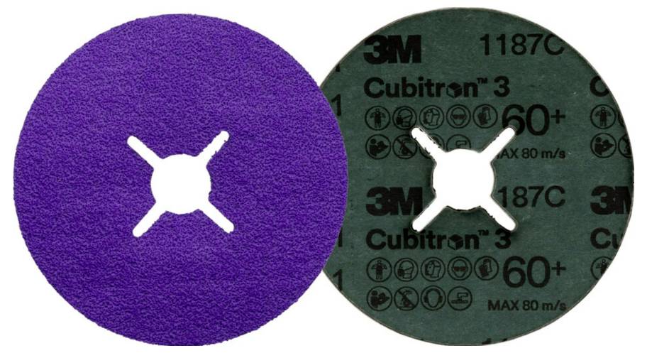 Two grinding wheels, one purple and one black, positioned side by side. The black wheel bears the manufacturer's logo and details.
