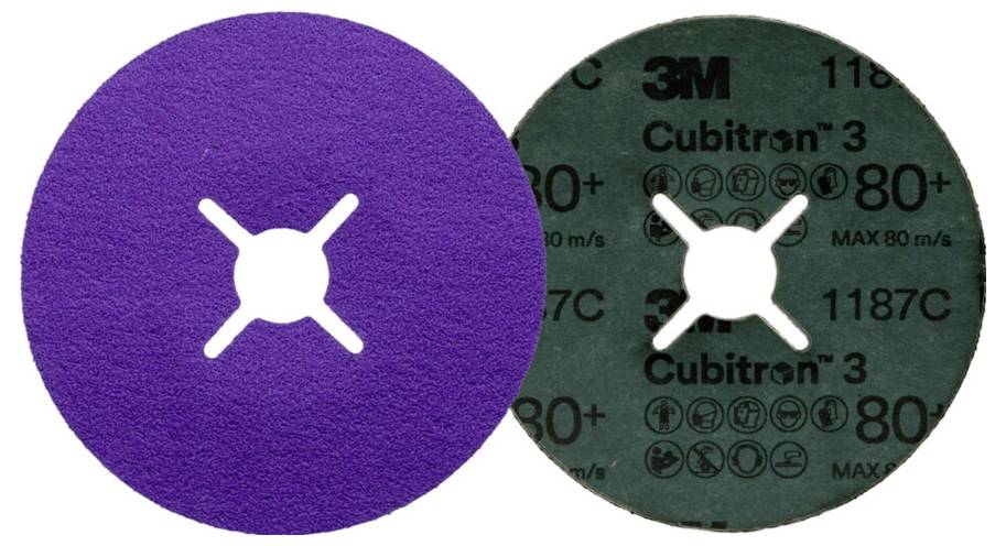 Two 3M Cubitron grinding discs, one purple and one green, placed side by side. Each has a central hole for mounting.
