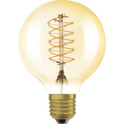 Light bulb with visible filament, radiating warm light.