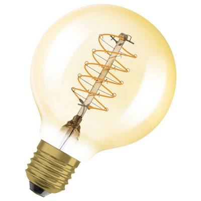 A light bulb with a visible spiral-shaped filament, emitting a warm, yellowish light.