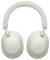 Grey, wireless headphones with oval ear cups and a padded headband. Modern design with no visible controls.