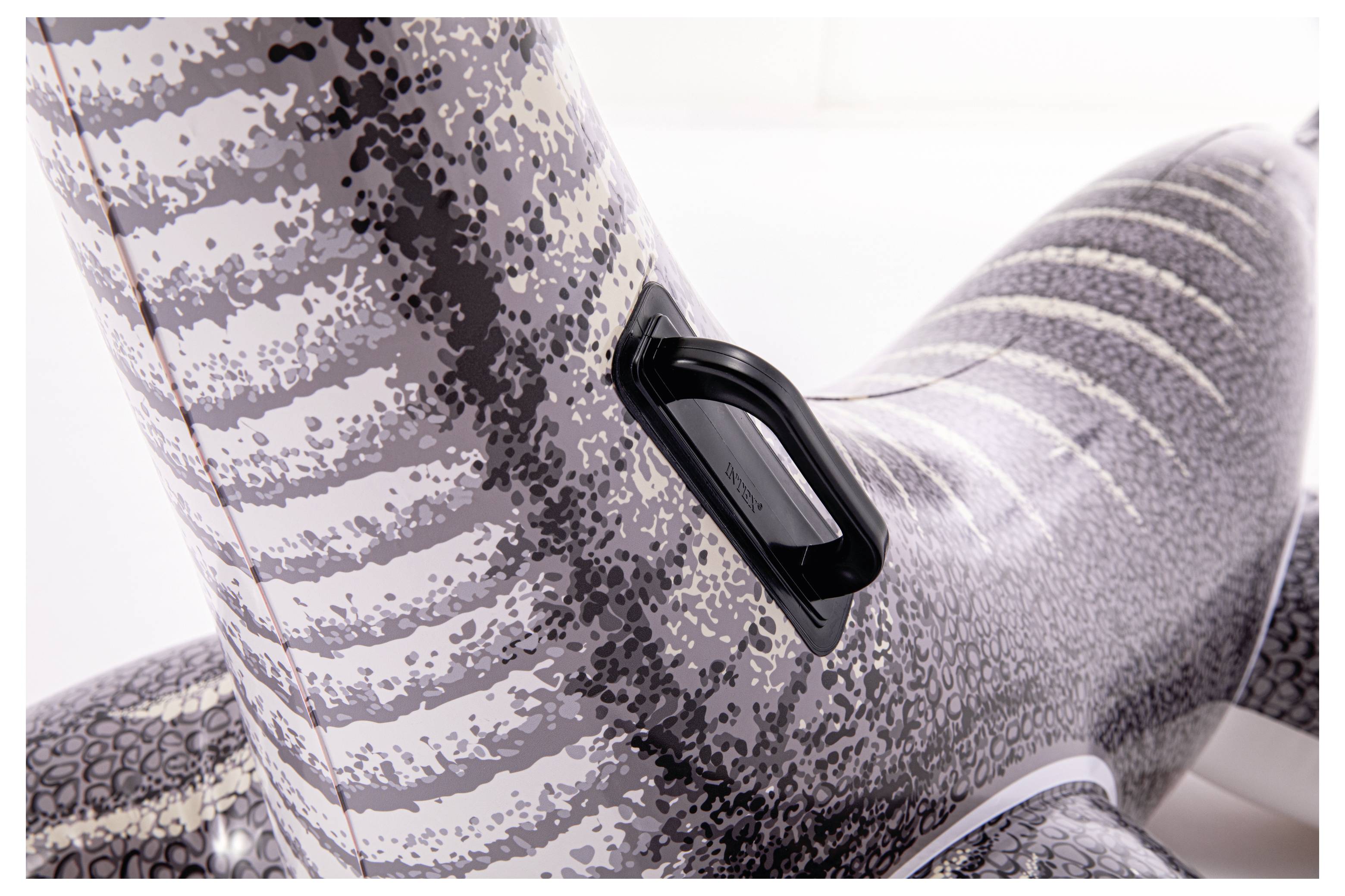 Inflatable item with a black and grey pattern, close-up of the handle on the side.