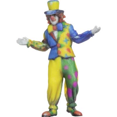 A colourfully dressed clown with a hat smiles and spreads his arms wide, as if greeting the audience or presenting a show.
