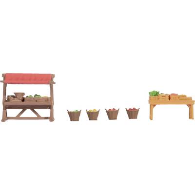 A miniature market stall with red awnings displays baskets full of various vegetables. A larger table is positioned to the left, with a smaller table to the right.