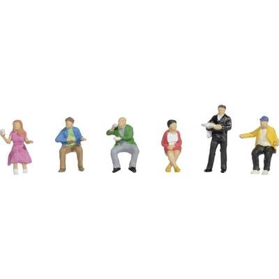 Six miniature figurines in various poses and colourful outfits, sitting or standing, with each figure holding an object.