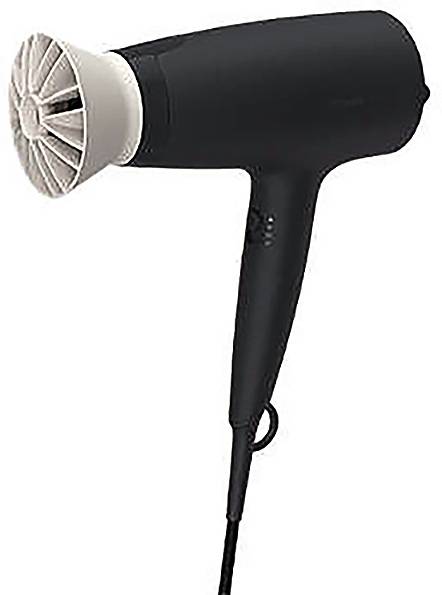 A black hairdryer with a light-coloured attachment, shown from the side. The power cable is visible.