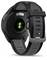 Black sports watch by Garmin, Forerunner 165 model, with grey strap and sensors on the back for heart rate monitoring.