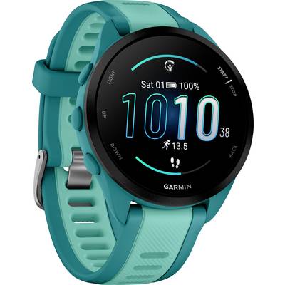 A turquoise smartwatch displays a large digital time of '10:10'. The display also shows the date, battery status, and step count.
