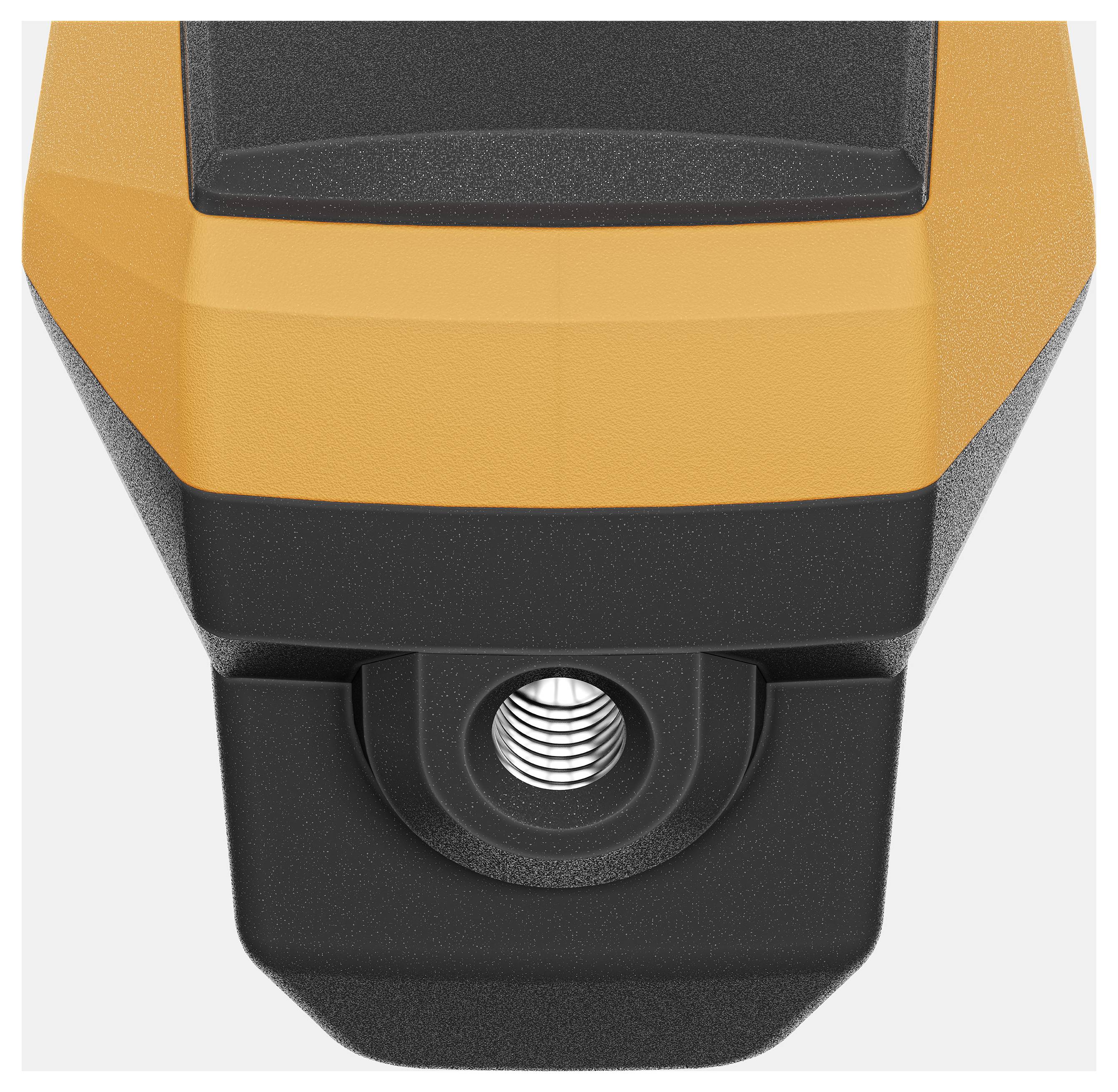 Close-up of a modern, orange-black device technology, possibly a sensor or measuring instrument, with a protruding lens.