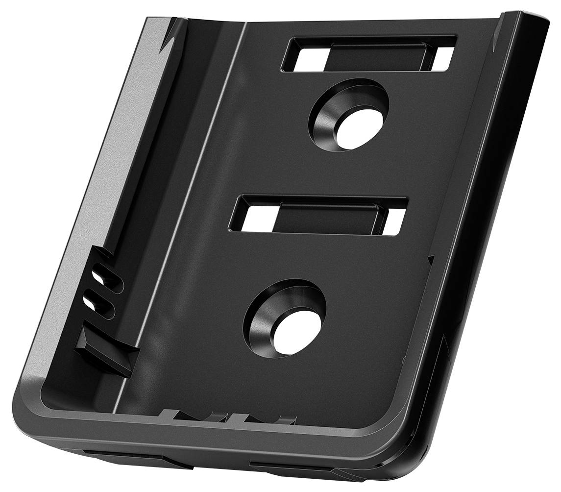 Black plastic component with multiple rectangular and circular openings, likely a mounting bracket or DIN rail.
