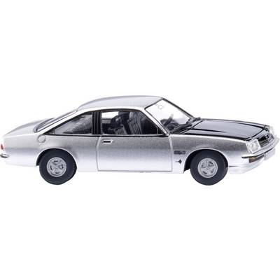 A silver-grey model car representing a classic two-door sports car with a gleaming surface.