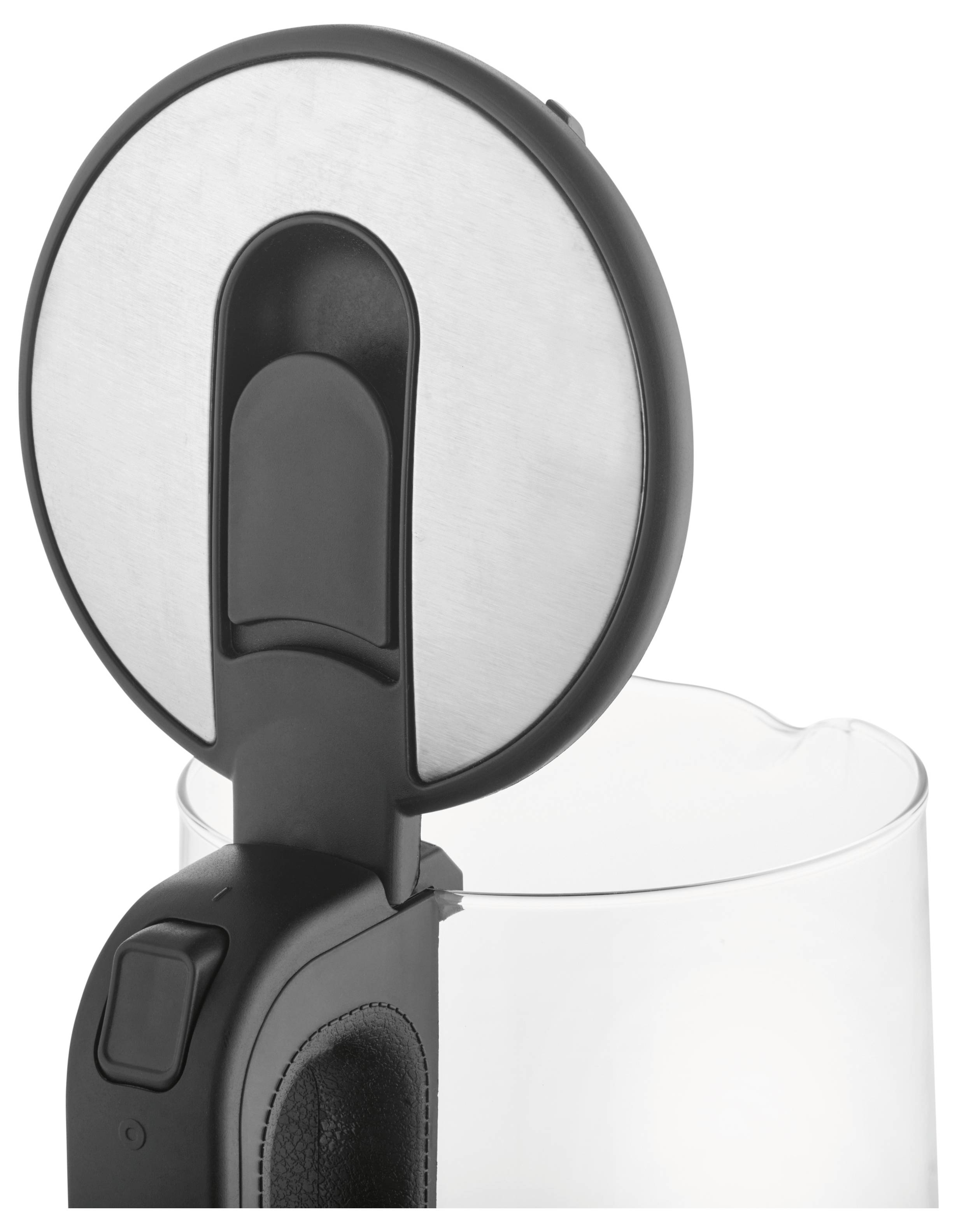 An open kettle with a visible lid positioned over a transparent container.