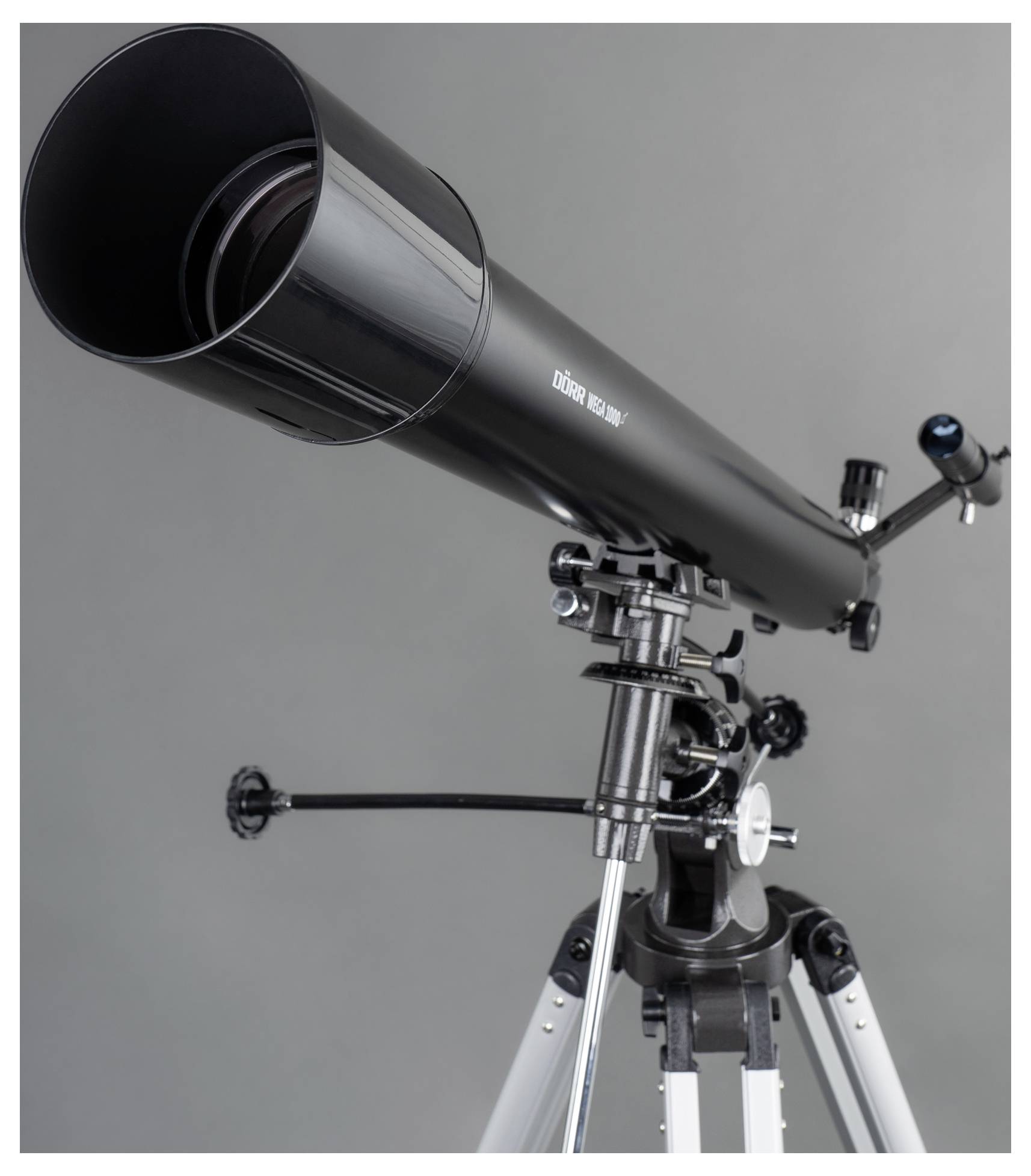 A black, professional telescope mounted on a tripod, positioned against a grey background.