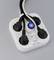 White multi-socket extension with four black plugs and illuminated blue switch.
